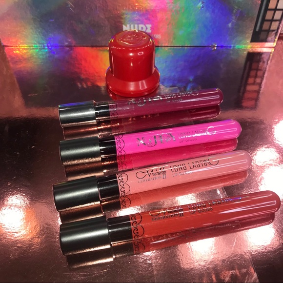 Other - • Beautiful set of 4 lip gloss W/ a lip plumper •